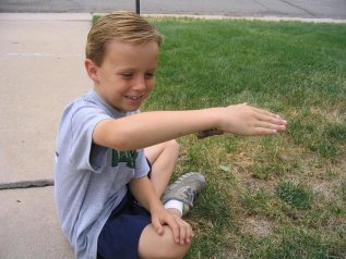 Garrett makes friends with a caterpillar in Colorado - July 2006