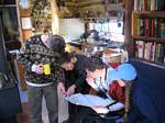 Neil, Teresa, Darin, and Barbara Study a Map of Michigan at Barr Camp - 12-24-2005