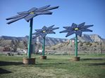 Solar Flowers at the Parachute, Colorado Rest Area by Roger J. Wendell - 04-21-2011