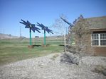 Solar Flowers at the Parachute, Colorado Rest Area by Roger J. Wendell - 04-21-2011