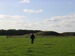 Roger J. Wendell walks towards Stonehenge mounds - 10-07-2006