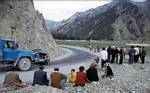 A Crowd Gathers Around our Chinese Car Wreck