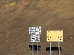 Observatory signs near the top of Mauna Kea, Hawaii