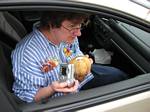 Drinking from a coconut on O'ahu, Hawai'i - February 2007