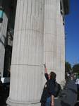 Tami Wendell pointing to bullet-marks at the GPO in Dublin, Ireland - October 2006